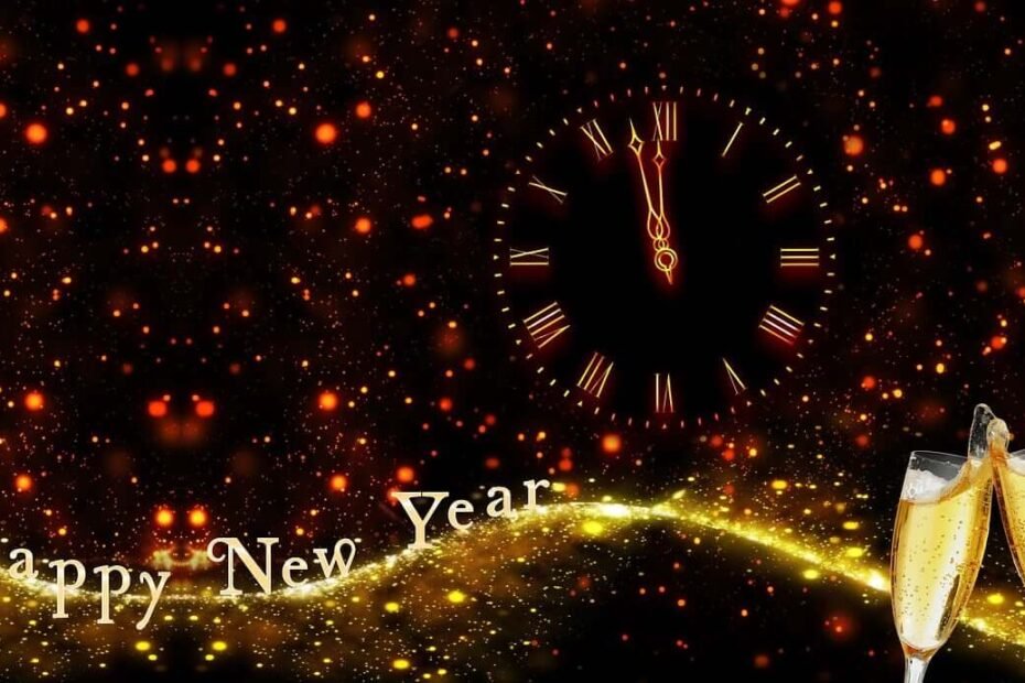 Happy New Year on background with 2 champagne glasses